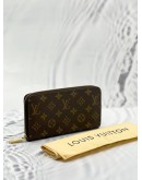 LOUIS VUITTON ZIPPED LONG WALLET IN BROWN MONOGRAM CANVAS GHW