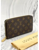 LOUIS VUITTON ZIPPED LONG WALLET IN BROWN MONOGRAM CANVAS GHW