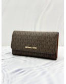 (UNUSED) MICHAEL KORS SIGNATURE LONG WALLET IN DARK BROWN BROWN CANVAS AND BROWN CALFSKIN LEATHER