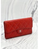 CHANEL PERFORATED LAMBSKIN LEATHER SNAP LONG WALLET IN RED