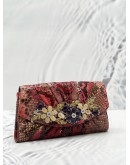 JUDITH LEIBER EXPLORES CRYSTAL AND EXOTICE IN MUTICOLOR PYTHON LEATHER DINNER CLUTCH