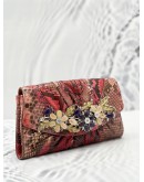 JUDITH LEIBER EXPLORES CRYSTAL AND EXOTICE IN MUTICOLOR PYTHON LEATHER DINNER CLUTCH