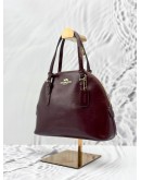 COACH DOME CROSSBODY BAG IN BURGUNDY PATENT LEATHER