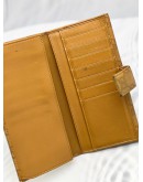 GUCCI LONG FLAP WALLET IN CARAMEL BROWN GUCCISSIMA LEATHER