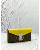 (LIKE NEW) LOUIS VUITTON TRIBAL MASK SARAH LONG WALLET IN YELLOW LEATHER / BROWN MONOGRAM CANVAS