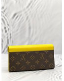 (LIKE NEW) LOUIS VUITTON TRIBAL MASK SARAH LONG WALLET IN YELLOW LEATHER / BROWN MONOGRAM CANVAS