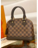 (UNUSED) 2024 MICROCHIP LOUIS VUITTON ALMA BB SMALL HANDLE BAG BROWN DAMIER EBENE CANVAS WITH ADJUSTABLE LEATHER STRAP - FULL SET -