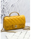 (LIKE NEW) MICROCHIP CHANEL RHINESTONE HANDLE GOLD CC LOGO YELLOW FLAP BAG 