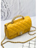 (LIKE NEW) MICROCHIP CHANEL RHINESTONE HANDLE GOLD CC LOGO YELLOW FLAP BAG 