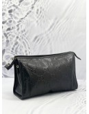 GUCCI EMBOSSED MONOGRAM POUCH 