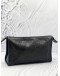 GUCCI EMBOSSED MONOGRAM POUCH 