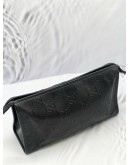 GUCCI EMBOSSED MONOGRAM POUCH 