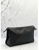 GUCCI EMBOSSED MONOGRAM POUCH 