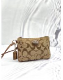 COACH CORNER ZIP WRISTLET POUCH BROWN SIGNATURE CANVAS