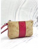 COACH CORNER ZIP WRISTLET POUCH KHAKI SIGNATURE CANVAS DARK PINK