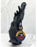 (UNUSED) BRAUN BUFFEL BLACK / MULTICOLOR KEYCHAIN