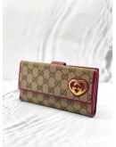 GUCCI BEIGE/MAGENTA GG CANVAS LOVELY HEART CONTINENTAL WALLET 