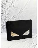 FENDI MONSTER EYES BUGS ZIPPED CLUTCH IN BLACK