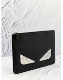 FENDI MONSTER EYES BUGS ZIPPED CLUTCH IN BLACK