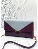 TOD'S PURPLE AND LIGHT BLUE CLUTCH WITH GOLD HARDWARE 