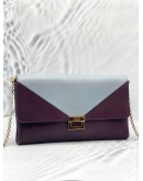 TOD'S PURPLE AND LIGHT BLUE CLUTCH WITH GOLD HARDWARE 