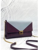 TOD'S PURPLE AND LIGHT BLUE CLUTCH WITH GOLD HARDWARE 