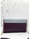 TOD'S PURPLE AND LIGHT BLUE CLUTCH WITH GOLD HARDWARE 
